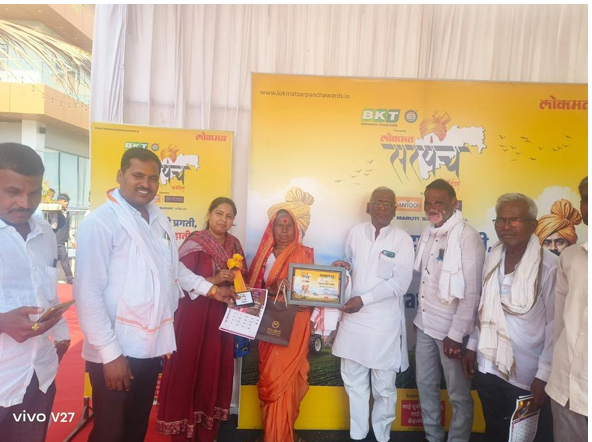 Lokmat Sarpanch Award received with a smile from the Hon'ble Vice-Chancellor, Vasantrao Naik Marathwada Agricultural University, Parbhani.