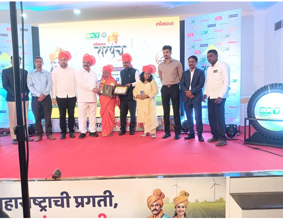 Lokmat Sarpanch Award received with a smile from the Hon'ble Vice-Chancellor, Vasantrao Naik Marathwada Agricultural University, Parbhani.